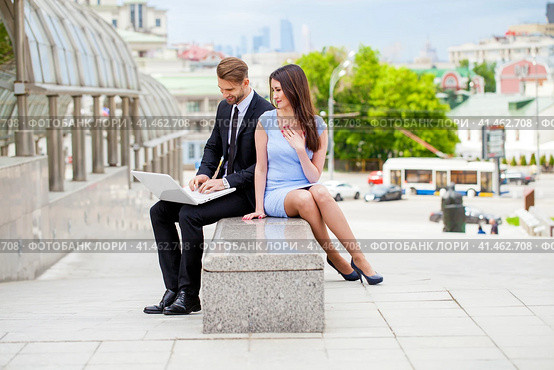 Attractive business young couple working together. Стоковое фото, фотограф Андрей Аркуша / Фотобанк Лори