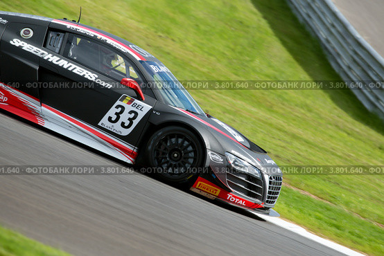Автомобиль Audi R8 LMS команды Belgium Audi Club Team WRT участвует в Чемпионате Eвропы FIA GT3 на трассе "Moscow Raceway" в Подмосковье (2012 год). Редакционное фото, фотограф Николай Винокуров / Фотобанк Лори