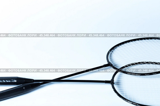 Badminton rackets on white. Стоковое фото, фотограф Сергей Толмачёв / Фотобанк Лори