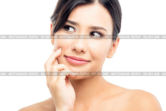 Beautiful and young asian woman thinking in something, isolated over a white background. Стоковое фото, агентство Ingram Publishing / Фотобанк Лори