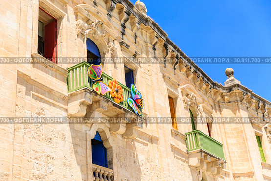 beautiful baroque building with bright doors and shutters built with sandstone (2019 год). Стоковое фото, фотограф Ирина Мойсеева / Фотобанк Лори