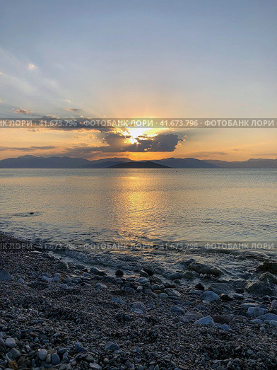 Beautiful sunset at the seaside, Greece. Редакционное фото, фотограф Екатерина Каляева / Фотобанк Лори