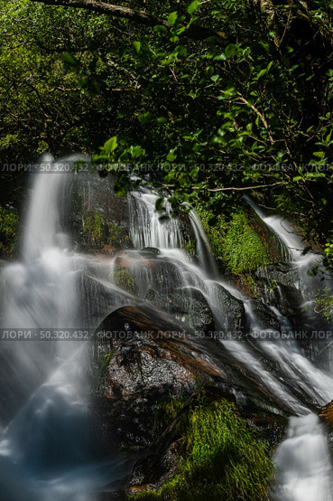 Beautiful waterfall in Frivela Portugal. Long exposure smooth effect. Стоковое фото, агентство Ingram Publishing / Фотобанк Лори