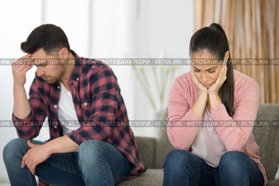beautiful young couple has had a quarrel at home. Стоковое фото, агентство Ingram Publishing / Фотобанк Лори