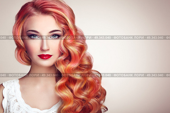 Beauty Fashion Model Girl with Colorful Dyed Hair. Girl with perfect Makeup and Hairstyle. Model with perfect Healthy Dyed Hair. Rainbow Hairstyles. Стоковое фото, агентство Ingram Publishing / Фотобанк Лори