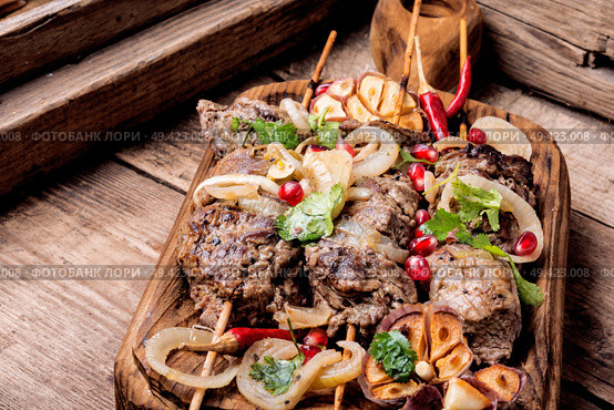 Beef shish kebab.Dishes of oriental cuisine.Eastern food. Shish kebab or shashlik. Стоковое фото, агентство Ingram Publishing / Фотобанк Лори