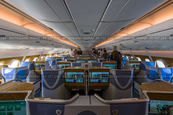 BERLIN, GERMANY - JUNE 02, 2016: Interior of business class of the world's largest aircraft Airbus A380. Emirates Airline. Exhibition ILA Berlin Air Show 2016. Редакционное фото, фотограф Sergey Kohl / Фотобанк Лори