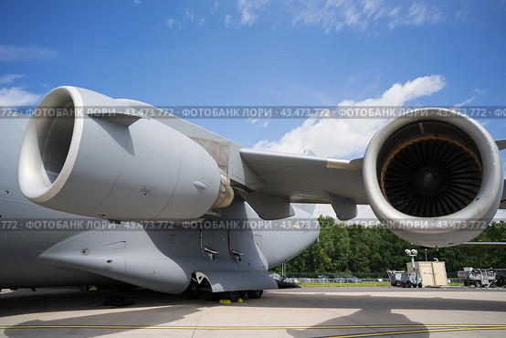 BERLIN - JUNE 06, 2024: The jet engine of strategic and tactical airlifter McDonnell Douglas-Boeing C-17 Globemaster III. US Air Force. ILA Berlin Air Show 2024. Редакционное фото, фотограф Sergey Kohl / Фотобанк Лори