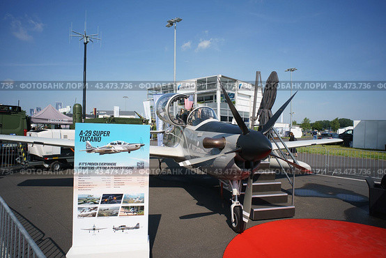 BERLIN - JUNE 06, 2024: The light attack and counter-insurgency aircraft Embraer EMB 314 Super Tucano. ILA Berlin Air Show 2024. Редакционное фото, фотограф Sergey Kohl / Фотобанк Лори
