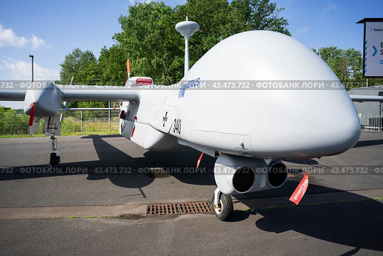 BERLIN - JUNE 06, 2024: The Reconnaissance Medium-altitude long-endurance unmanned aerial vehicle IAI Eitan ("Steadfast"), also known as Heron TP. ILA Berlin Air Show 2024. Редакционное фото, фотограф Sergey Kohl / Фотобанк Лори
