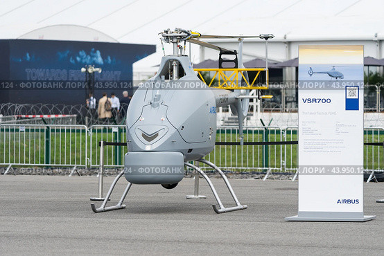 BERLIN - JUNE 07, 2024: An unmanned reconnaissance helicopter Airbus VSR700. ILA Berlin Air Show. Редакционное фото, фотограф Sergey Kohl / Фотобанк Лори
