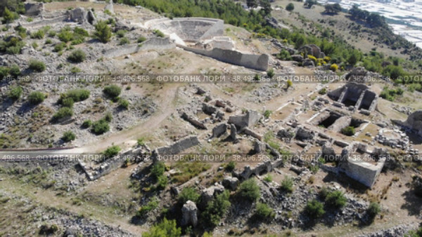 Bird's eye view of Rhodiapolis remains, near Kumluca in Antalya Province, Turkey. Стоковое видео, видеограф Яков Филимонов / Фотобанк Лори