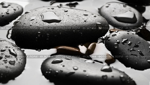 Black wet pebbles background wallpaper. Black wet pebbles background. Стоковое фото, агентство Ingram Publishing / Фотобанк Лори