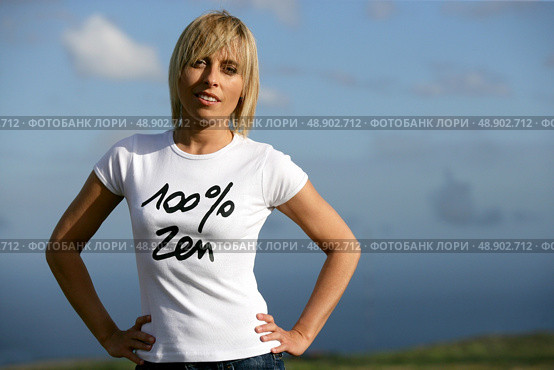 Blond woman with attitude, stood outdoors. Стоковое фото, агентство Ingram Publishing / Фотобанк Лори