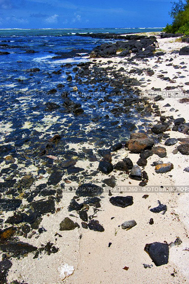 blue bay foam footstep indian ocean some stone in the island of deus cocos in mauritius . Стоковое фото, агентство Ingram Publishing / Фотобанк Лори