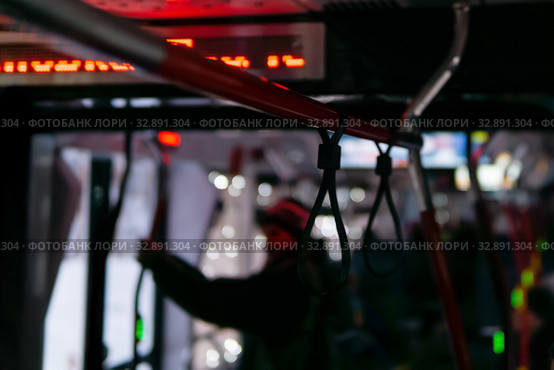Blurred background with dark interior of public transport. Стоковое фото, фотограф Евгений Харитонов / Фотобанк Лори