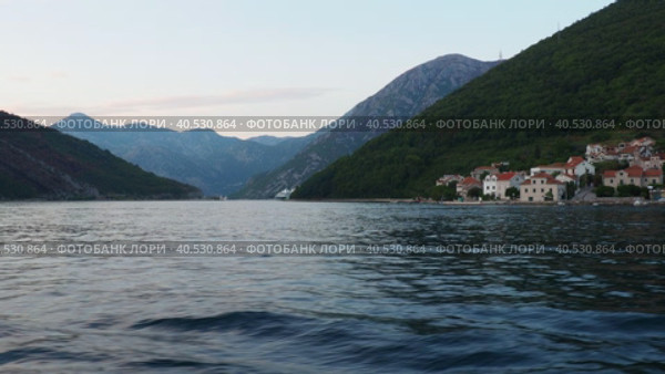 Boka Kotor Adriatic Sea, Verige Strait Kamenari Lepetane Ferry Line Trajekt. Ferryboat for passenger, cargo and vehicles. Tourism and business in Montenegro. Maritime transport coastal. August 16 2022. Стоковое видео, видеограф Юлия Петровская / Фотобанк Лори