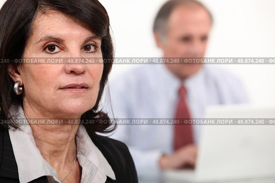 Bored and tired woman at work. Стоковое фото, агентство Ingram Publishing / Фотобанк Лори