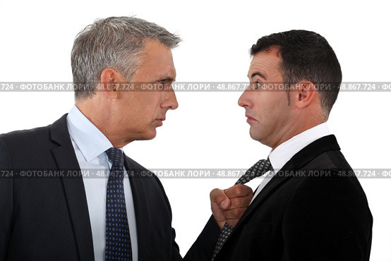 Boss threatening employee. Стоковое фото, агентство Ingram Publishing / Фотобанк Лори
