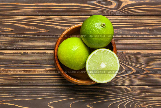 Bowl of ripe bergamot fruits on wooden background. Стоковое фото, фотограф Pixel_shot / Фотобанк Лори