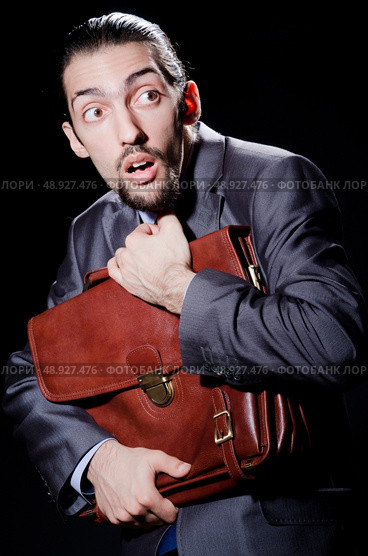 Business spy with briefcase. Стоковое фото, агентство Ingram Publishing / Фотобанк Лори