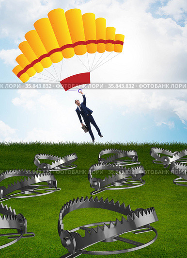 Businessman falling into trap on parachute. Стоковое фото, фотограф Elnur / Фотобанк Лори