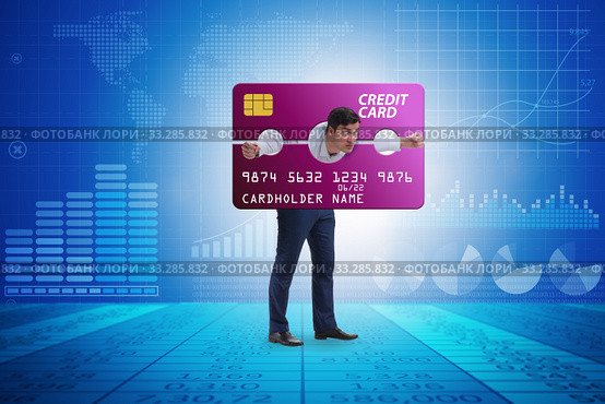 Businessman in credit card burden concept in pillory. Стоковое фото, фотограф Elnur / Фотобанк Лори