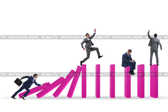 Businessman in domino effect concept. Стоковое фото, фотограф Elnur / Фотобанк Лори