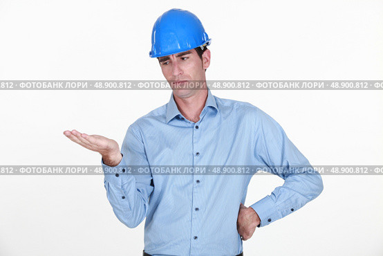businessman looking skeptic about something. Стоковое фото, агентство Ingram Publishing / Фотобанк Лори