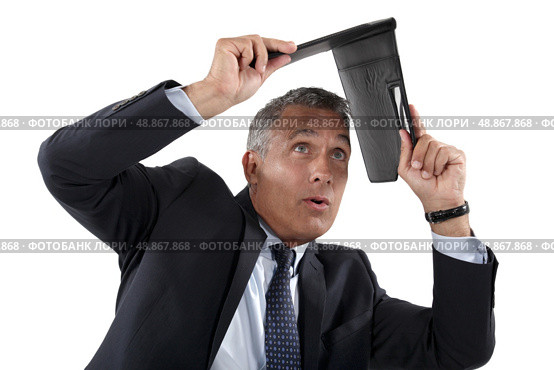 Businessman shielding himself. Стоковое фото, агентство Ingram Publishing / Фотобанк Лори