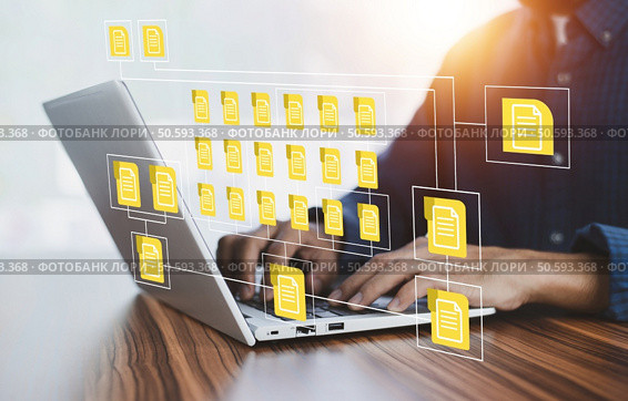 Businessman using computer Software for security, searching and managing corporate files, Corporate data management system and document management system with employee privacy. Стоковое фото, агентство Ingram Publishing / Фотобанк Лори