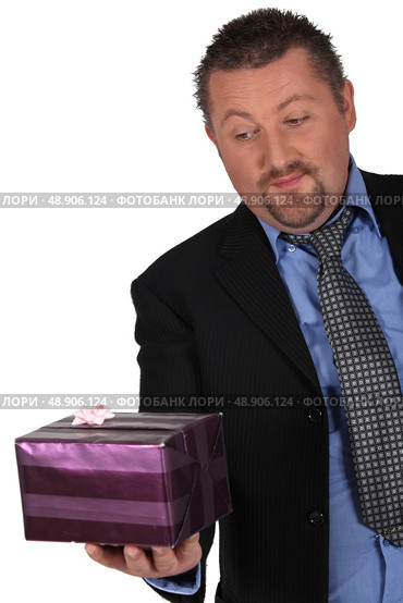 Businessman with a  gift. Стоковое фото, агентство Ingram Publishing / Фотобанк Лори