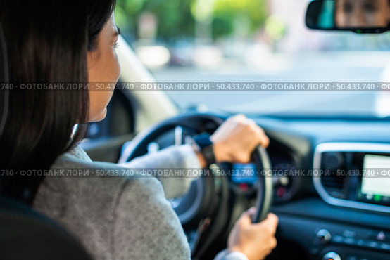 businesswoman driving car. Стоковое фото, агентство Ingram Publishing / Фотобанк Лори