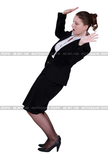 Businesswoman struggling to keep balance. Стоковое фото, агентство Ingram Publishing / Фотобанк Лори