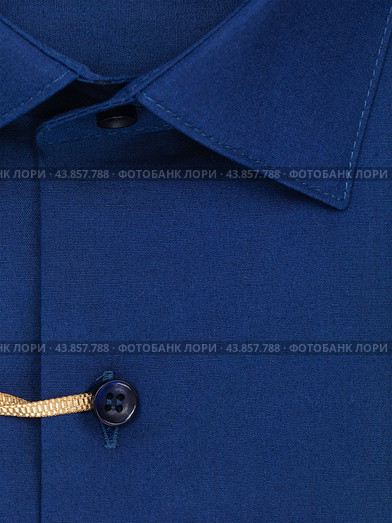 Button placket on a plain dark blue men's shirt, close-up. Стоковое фото, фотограф Сергей Чайко / Фотобанк Лори