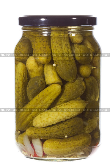 Can of cucumbers isolated on the white background. Стоковое фото, агентство Ingram Publishing / Фотобанк Лори