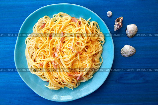 Carbonara italian Spaghetti pasta with bacon and cream. Стоковое фото, агентство Ingram Publishing / Фотобанк Лори