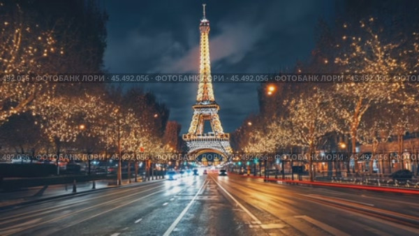 Cars driving on avenue d'iena with eiffel tower at night. Стоковое AI-видео, аниматор Юрий Поздников / Фотобанк Лори