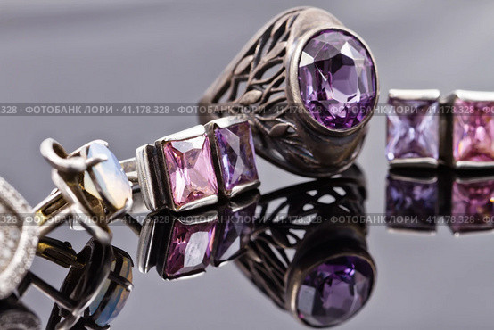 Carved silver ring with earrings with purple gemstones. Стоковое фото, фотограф Сергей Сергеев / Фотобанк Лори