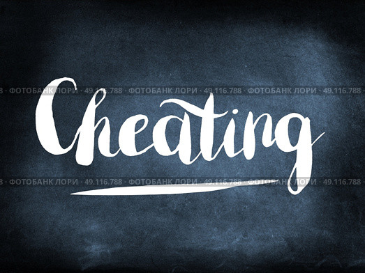 Cheating handwritten on a chalkboard. Стоковое фото, агентство Ingram Publishing / Фотобанк Лори