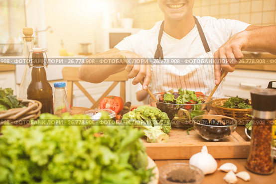 Chef man cooking in the kitchen. Стоковое фото, фотограф Кирилл Греков / Фотобанк Лори