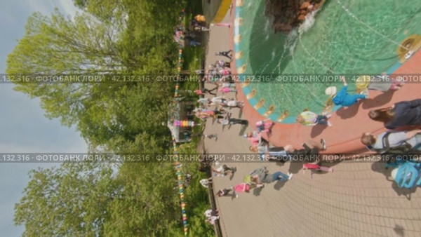 Cherepovets, Russia - May 27, 2023, Sunny Playdates and Family Moments at the Park. FPV Aerial Drone Shot. Vertical. Редакционное видео, видеограф Даниил Хабаров / Фотобанк Лори