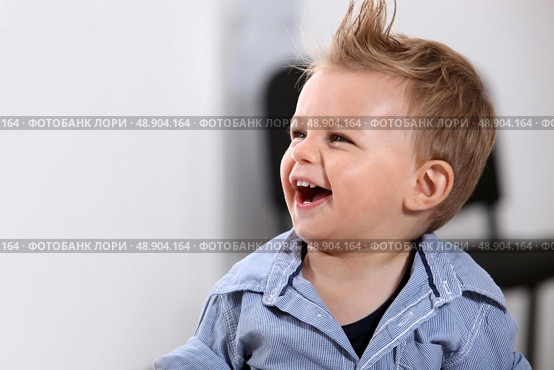 Child laughing. Стоковое фото, агентство Ingram Publishing / Фотобанк Лори
