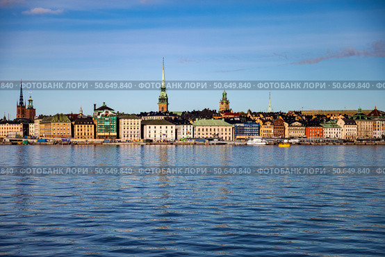 Cityscape View of Gamla Stan in Stockholm on a Sunny Day (2024 год). Редакционное фото, фотограф Aleksandr Golubev / Фотобанк Лори