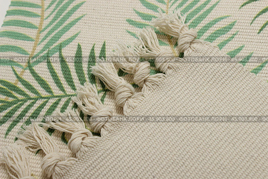 Close up green cotton rug with tassels edge. Стоковое фото, фотограф Максимова Марина / Фотобанк Лори