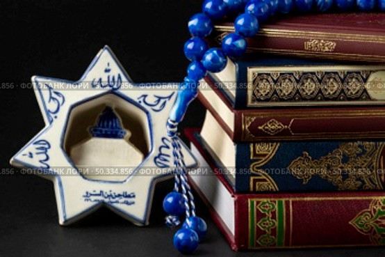 close up islamic new year quran books. Стоковое фото, агентство Ingram Publishing / Фотобанк Лори