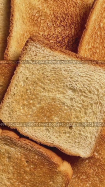 Close-up of a toast with lots of holes. Стоковое видео, видеограф Ярославский Максим / Фотобанк Лори