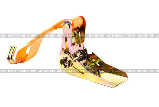 Close-up of metal ratchet tie-down with orange lashing strap and black hook on white background. Ideal for logistics, storage, or cargo control. Стоковое фото, фотограф Татьяна Терехина / Фотобанк Лори