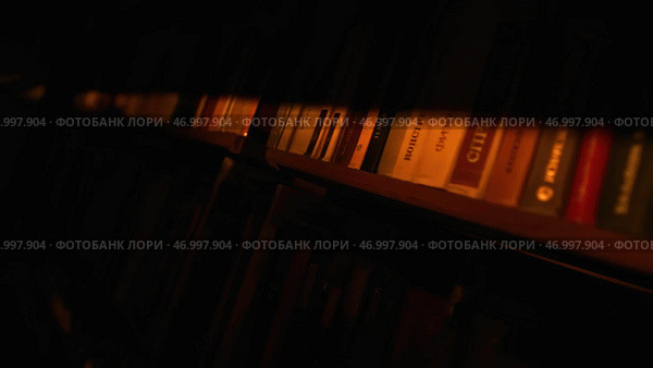 Close up of the books on the shelves of the library. Стоковое фото, фотограф David Kashakhi / Фотобанк Лори