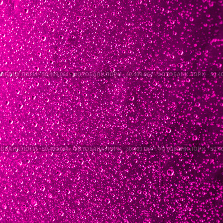close up pink abstract water drops background. Стоковое фото, агентство Ingram Publishing / Фотобанк Лори
